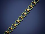 an image of a green and gold bracelet on a blue background