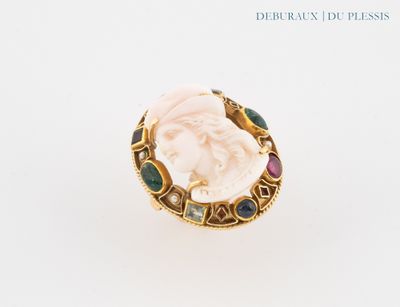 an image of a ring with a woman ' s face on it