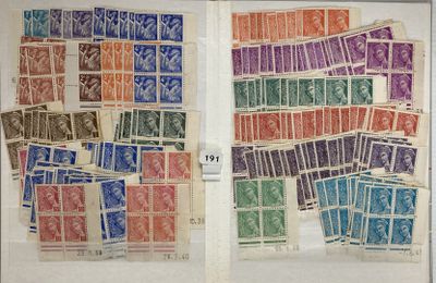 an open book with a bunch of different colored stamps on it