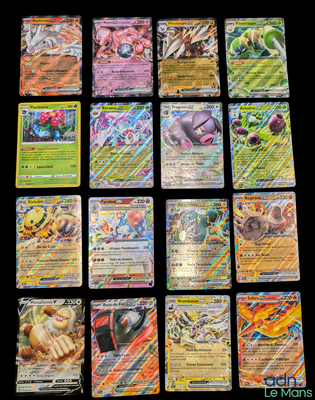 several pokemon cards are arranged on a black surface