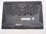 a black laptop with a blue sticker on it