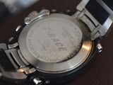 a close up of a wrist watch on a table