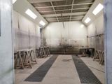 an image of a large room with a lot of work on it