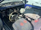 a car that has a steering wheel and a dash board in it