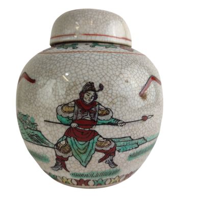 a white vase with a picture of a man holding a sword