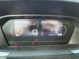 the dashboard of a car with a digital display on it