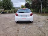 a white car that is parked in a parking lot