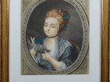painting of a woman holding a bird in a gold frame