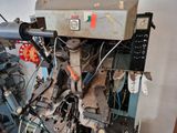 an image of a machine that is working on a piece of paper