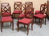 six chairs that are lined up in a room