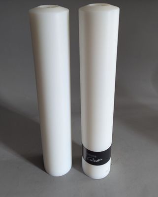 two white vases sitting next to each other on a table