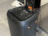 a piece of luggage sitting on the floor next to a counter