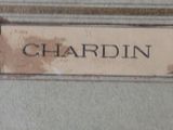 a sign that says chardin on the wall