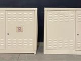 two white lockers sitting next to each other on the floor