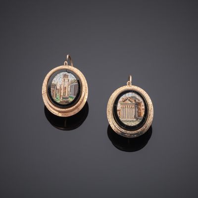 a pair of gold and enamel earrings