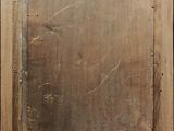 an image of a wooden frame with a mirror on top of it