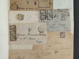 many different types of letters and envelopes on the wall