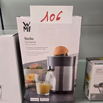 packaging for a juicer and a juicer on display in a store