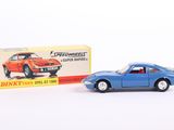 a blue toy car next to a box on a white surface