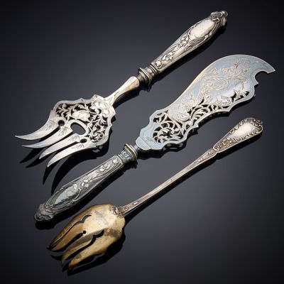 three pieces of silverware including a knife, fork and spoon