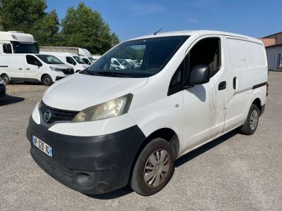 the white van is parked in a parking lot with other vehicles