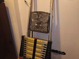 a ladder that is leaning against a wall in a room