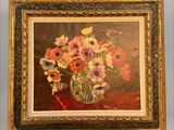 une peinture à l'huile représentant des fleurs dans un vase sur une table