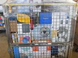 a large metal cage with a bunch of books on it