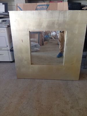 a picture of a picture of a dog looking in a mirror