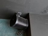 a picture of a camera mounted to the ceiling