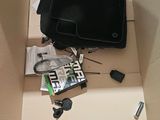 a box with a laptop and other electronics inside of it