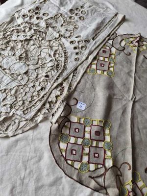 two pieces of cloth that are on a table