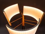 a light that is on in the middle of a lamp