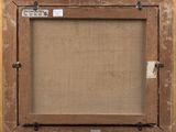 a close up of a picture frame on a wooden wall