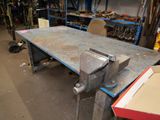 an image of a workbench in a workshop with tools on it