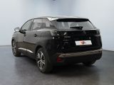 a picture of a black car parked in a garage