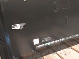 an image of a monitor on a pallet in a warehouse