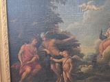 a painting on the wall of a room with a painting of a man and a woman