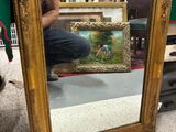 une photo d'un homme se prenant en photo dans un miroir