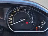 a close up of a car dashboard with a speedometer