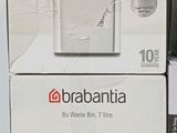 two boxes of brabantia air purifier sitting on a table