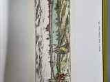 a picture of a book with a picture of a river in it