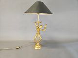 a lamp that is sitting on a table with a lamp on it