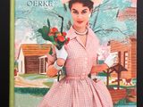 un vieux livre avec l'image d'une femme en robe et chapeau