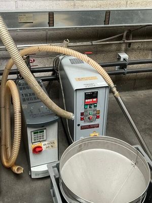 an image of a machine that has a large pot in it