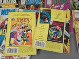 a lot of comic books that are on the table