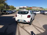 a white car that is parked in a parking lot