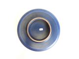 a blue bowl with a brown rim on a white surface