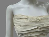 an image of a mannequin wearing a strapless dress