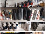 many different types of hair products on the shelves